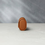 Rome, four-watch roll Four-watch oval-shaped roll in whisky-tan grained leather | Available Worldwide | A Collected Man