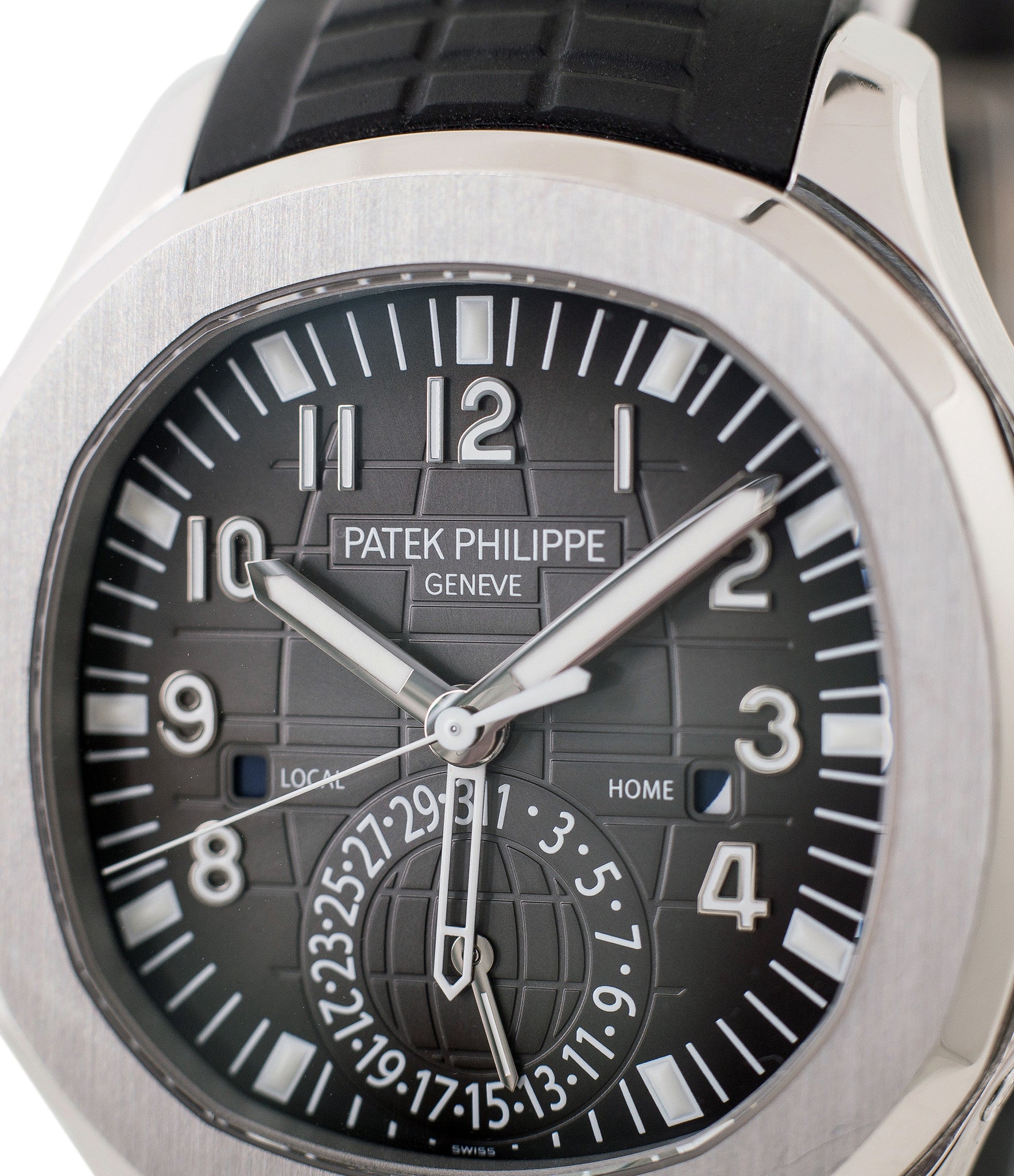 buy Patek Philippe Aquanaut Travel-time 5164A-001 steel pre-owned traveller automatic watch black dial dual time zone with box and papers for sale at WATCH XCHANGE London authenticity guaranteed